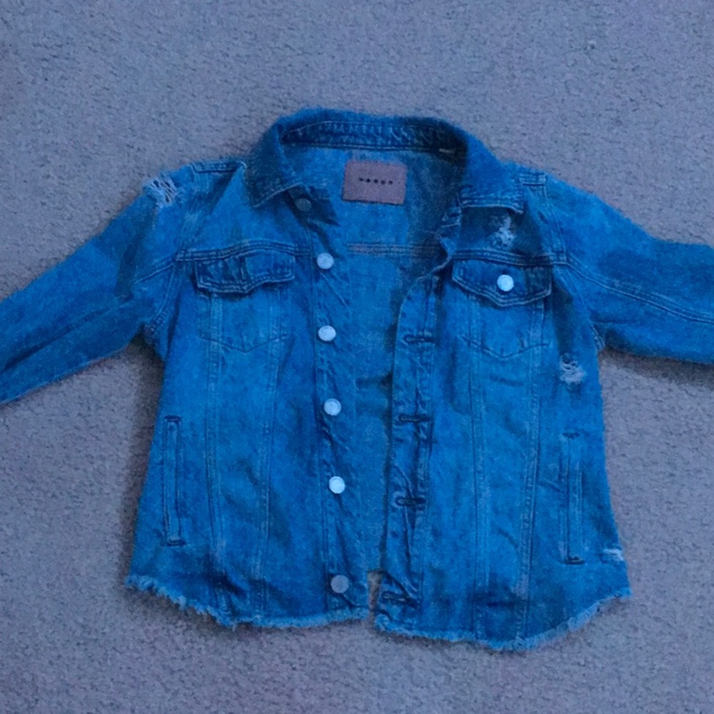 A wash blue ripped Jean jacket with buttons!!!